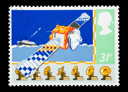 United Kingdom - circa 1985: Mail stamp printed in the UK depicting maritime satellite navigation technology.のeditorial素材