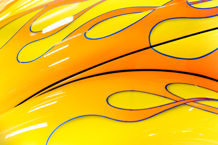 colorful flaming paintwork on a custom hotrodの写真素材