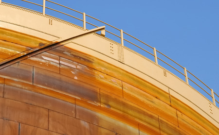 large rusting steel refinery storage facilityの写真素材