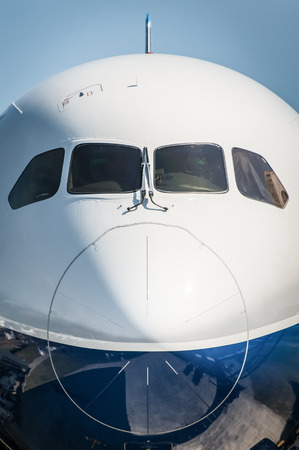 nose cone closeup of a larger passenger jet airlinerの写真素材