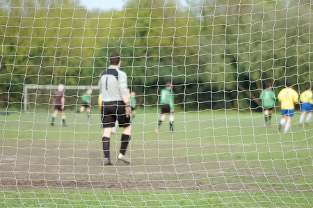 soccer net and goal keeper teamwork conceptの写真素材
