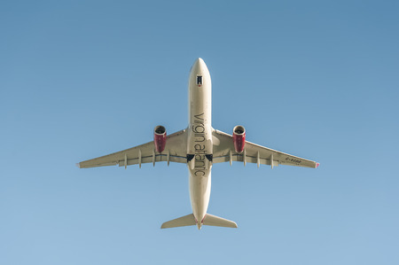 Heathrow, London, UK - January 28, 2016: Airbus A330-343 G-VGBR departing Heathrow, UK in a clear blue sky bound for Miami International, USAのeditorial素材