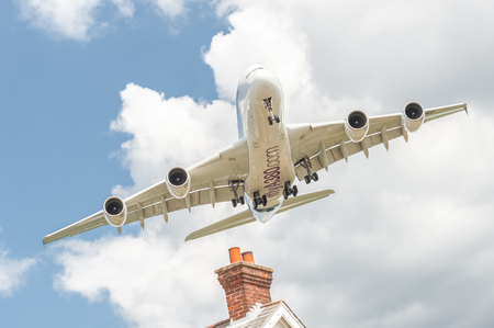 Farnborough, UK - July 14, 2016: Airbus A380 on a low banked approach before landing at an aviation trade eventのeditorial素材