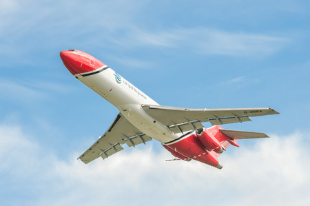 Farnborough, UK - July 14, 2016: Boeing 727 oil spill response aircraft operated by OSRL, taking-off from an aviation trade event in Farnborough, UKのeditorial素材