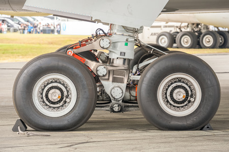 Farnborough, UK - July 15, 2016: Closeup section of an Airbus A350 undercarriage on the taxiway at an aviation trade event in Farnborough, UKのeditorial素材