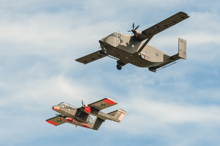 Farnborough, UK - July 18, 2016: Short SC7 Skyvan and a vintage Rockwell OV-10 Bronco light attack aircraft on take-off from Farnborough, UKのeditorial素材