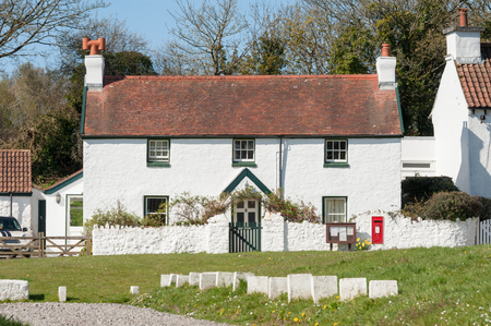 Penrice, Wales, UK - April 17, 2016: Bay View Cottage, built in the 18th century and part of the historic Penrice Castle Estate, a popular vacation destination in The Gower, Wales, UKのeditorial素材