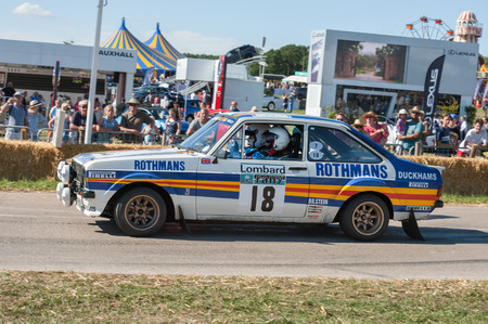 Laverstoke, Hampshire, UK - August 25, 2016: Classic rally-spec Ford Escort RS2000 speeding down the course at the CarFest motoring event in Laverstoke, UKのeditorial素材