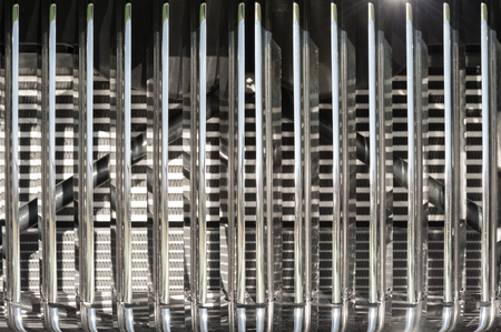 closeup abstract of a vintage chromed vehicle grilleの写真素材