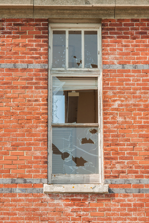 closeup of derelict and broken office windowsの写真素材