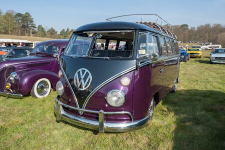 Fully restored purple split-screen Volkswagen Camper at a meeting of classic vehicles in Rushmoor, UK - April 19, 2019のeditorial素材