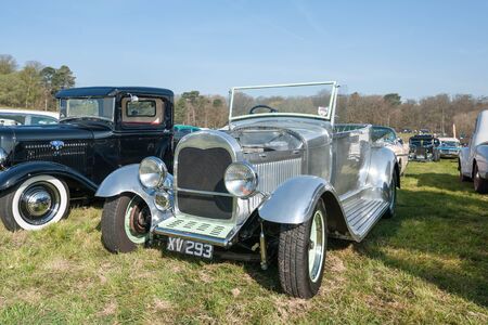 Fully chromed custom restoration of a Ford Model A at a meeting of vintage vehicles in Rushmoor, UK - April 19, 2019のeditorial素材