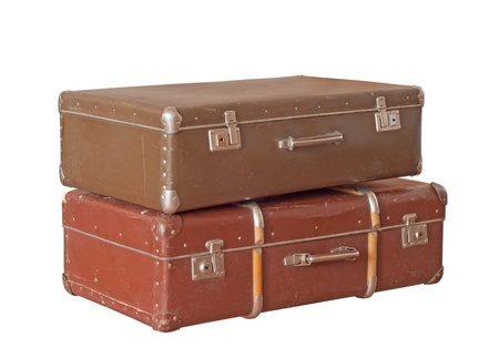 scratched old suitcase on white backgroundの写真素材