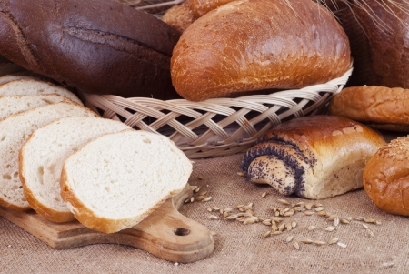 composition of bread and wheat spikeletsの写真素材