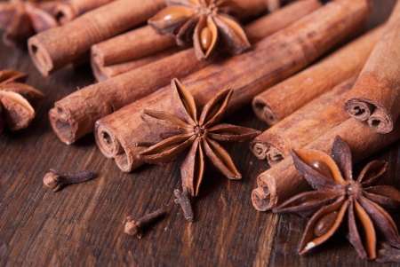 Background with spices ( cinnamon, star anise, cloves )の写真素材