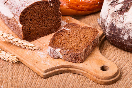fresh bread and wheat on the burlap