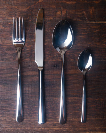 Table settings on wooden  background.の写真素材