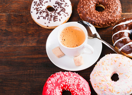 Breakfast with coffee and  donatsの写真素材