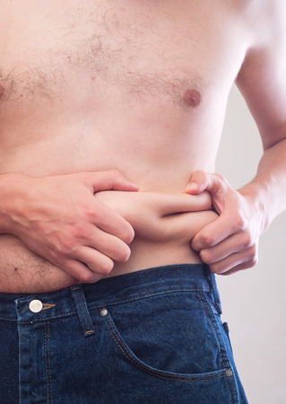 belly of a fat manの写真素材