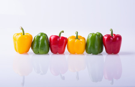 Green , yellow and red bell pepper ( paprika )