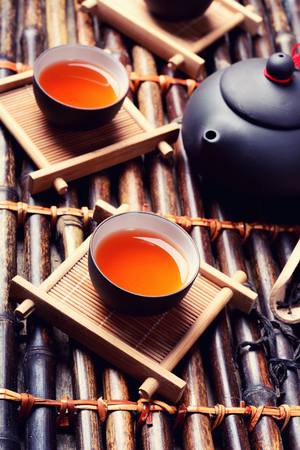 Asian tea set on bamboo backgroundの写真素材