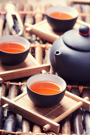 Asian tea set on bamboo backgroundの写真素材