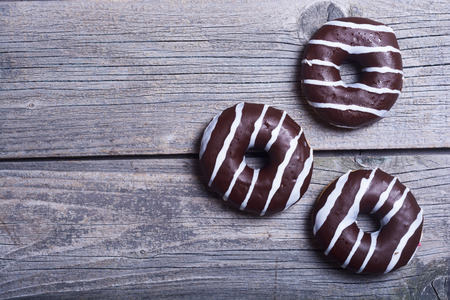 assorted donuts with chocolate frosted , pink glazedの写真素材
