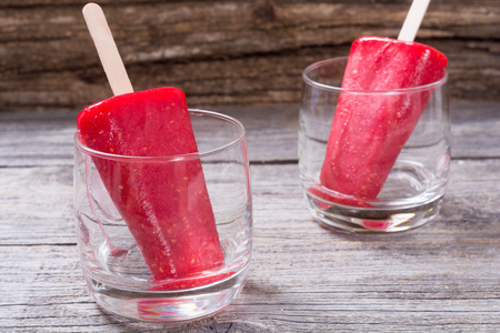 Colorful homemade popsicle with strawberry .の写真素材