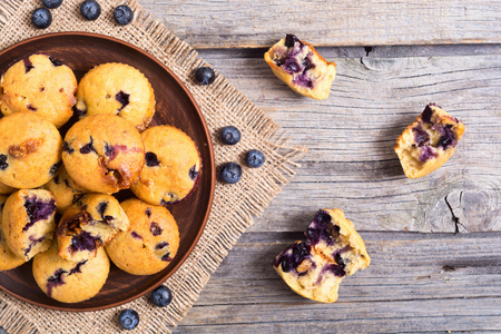 Banana muffins with blueberry on rustic background . Top view , copy spaceの写真素材