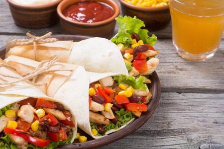 Mexican burrito with chicken , pepper and beansの写真素材