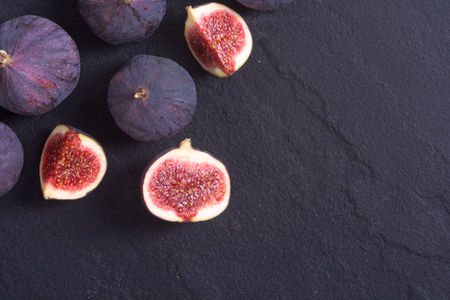 Ripe sweet figs . Healthy mediterranean fig fruit . Top view , space for textの写真素材