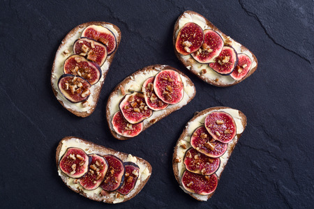 Toast with figs , walnuts and  honeyの写真素材