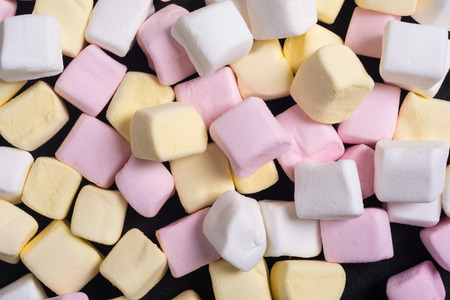 Colorful marshmallow background . White , pink and yellowの写真素材
