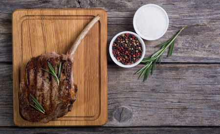 Grilled tomahawk steak beef . With rosemaryの写真素材