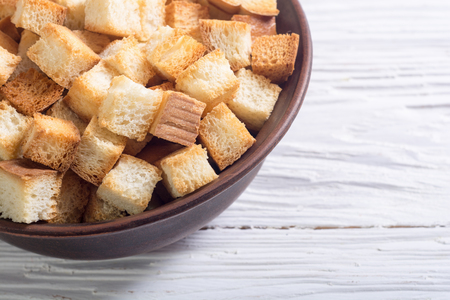 Crispy croutons in bowl . Food backgroundの写真素材