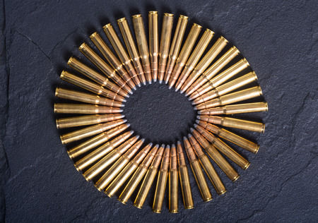 Bullets. Gun cartridge 8mm caliber background