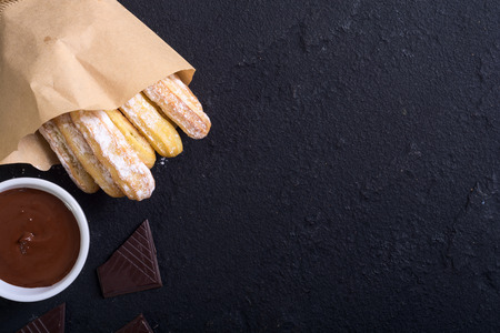 Spanish and mexican dessert : homemade churros  with chocolateの写真素材