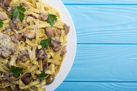 Pasta tagliatelle with chicken meat and mushroom . Italian foodの写真素材