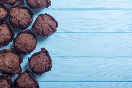 Sweet dessert chocolate muffins or cupcake . Food backgroundの写真素材