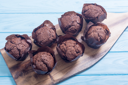 Sweet dessert chocolate muffins or cupcake . Food backgroundの写真素材