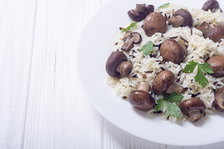 Traditional Italian risotto with wild rice , mushroom and parmesanの写真素材