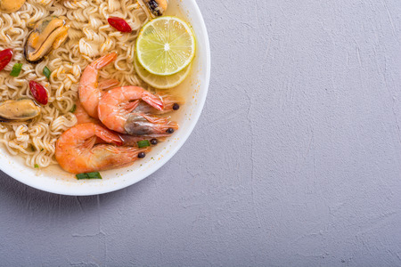 Instant noodles soup with shrimps and mussels . Asian foodの写真素材