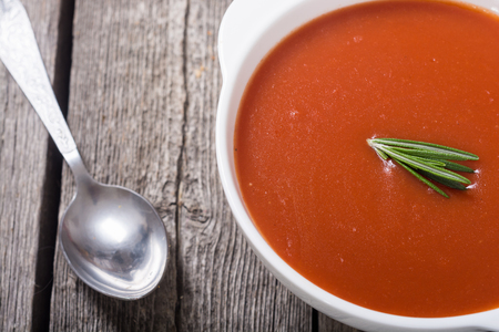 Fresh tomato cream soup in bowl . Healthy vegetarian foodの写真素材