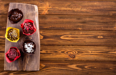 Colorful chocolate homemade muffins . Traditional american food dessertの写真素材