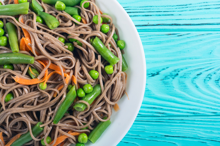 Soba noodles salad . Asian food background . Japanese bowlの写真素材