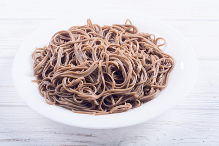 Japanese soba noodles on a plate . Asian food backgroundの写真素材