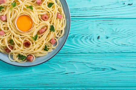 Italian pasta carbonara with sausage and egg . Spaghetti food backgroundの写真素材