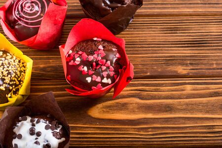 Colorful chocolate homemade muffins . Traditional american food dessertの写真素材