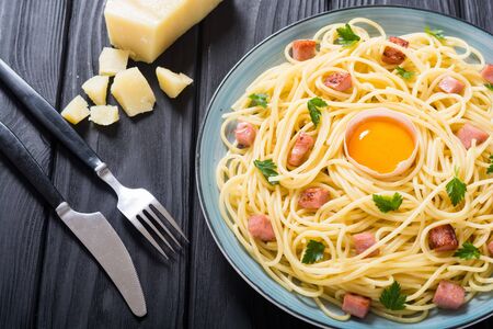 Italian pasta carbonara with sausage and egg . Spaghetti food backgroundの写真素材
