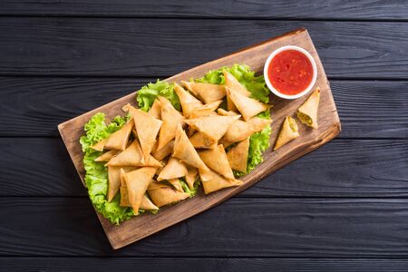 Ramadan iftar meal. Traditional asian vegetarian food - samosa